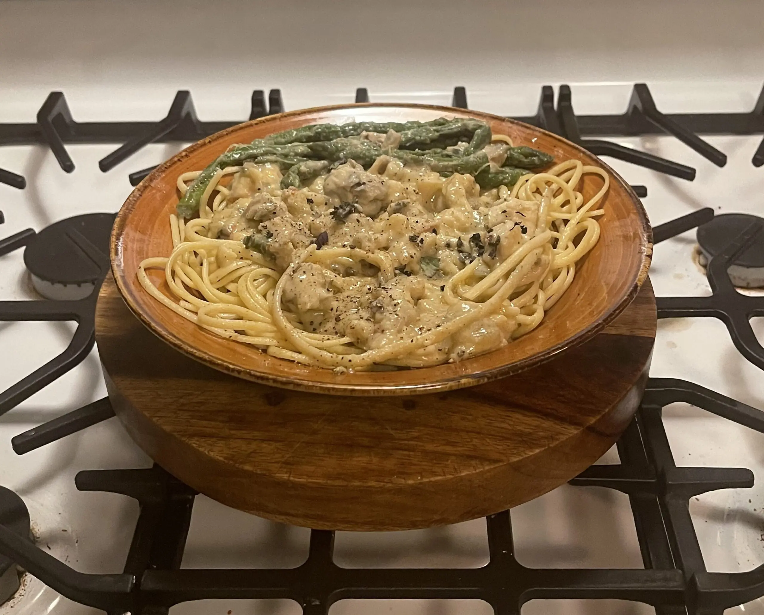 Butter Poached Lobster Tails in Garlic, Caper, Sauce over Fettuccine