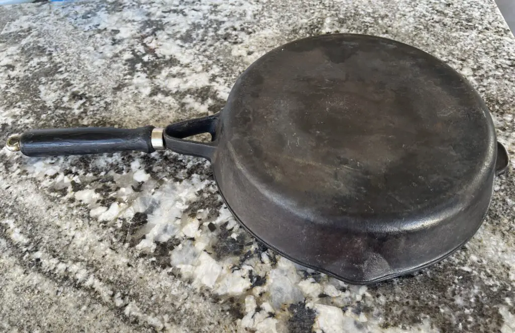 Cast Iron Pan Bottom Before Cleaning & Repair